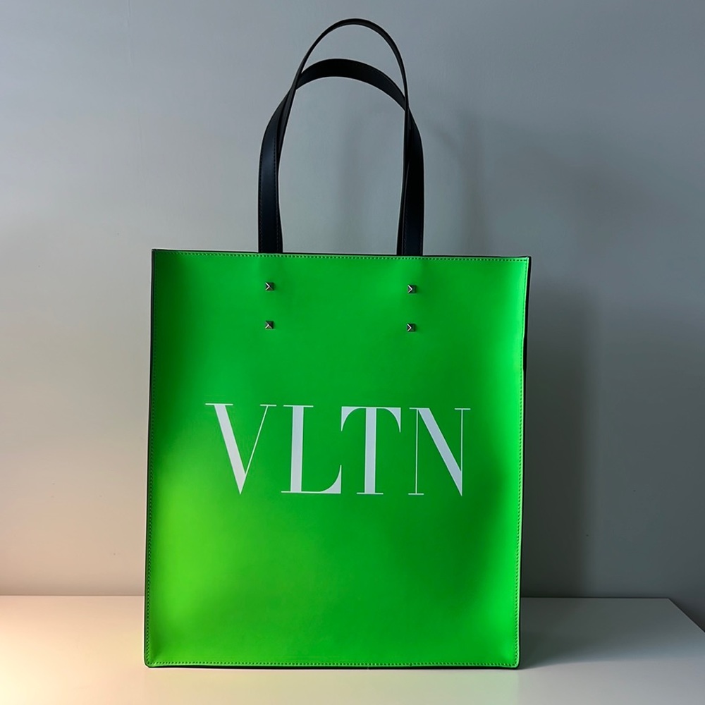 100% new & authentic! VLTN bag with crossbody strap & pouch in Acid Green. New!